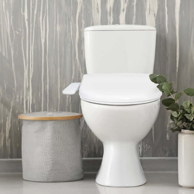 BidetMate 1000 Series Smart Bidet Toilet Seat installed in modern bathroom with stylish decor.