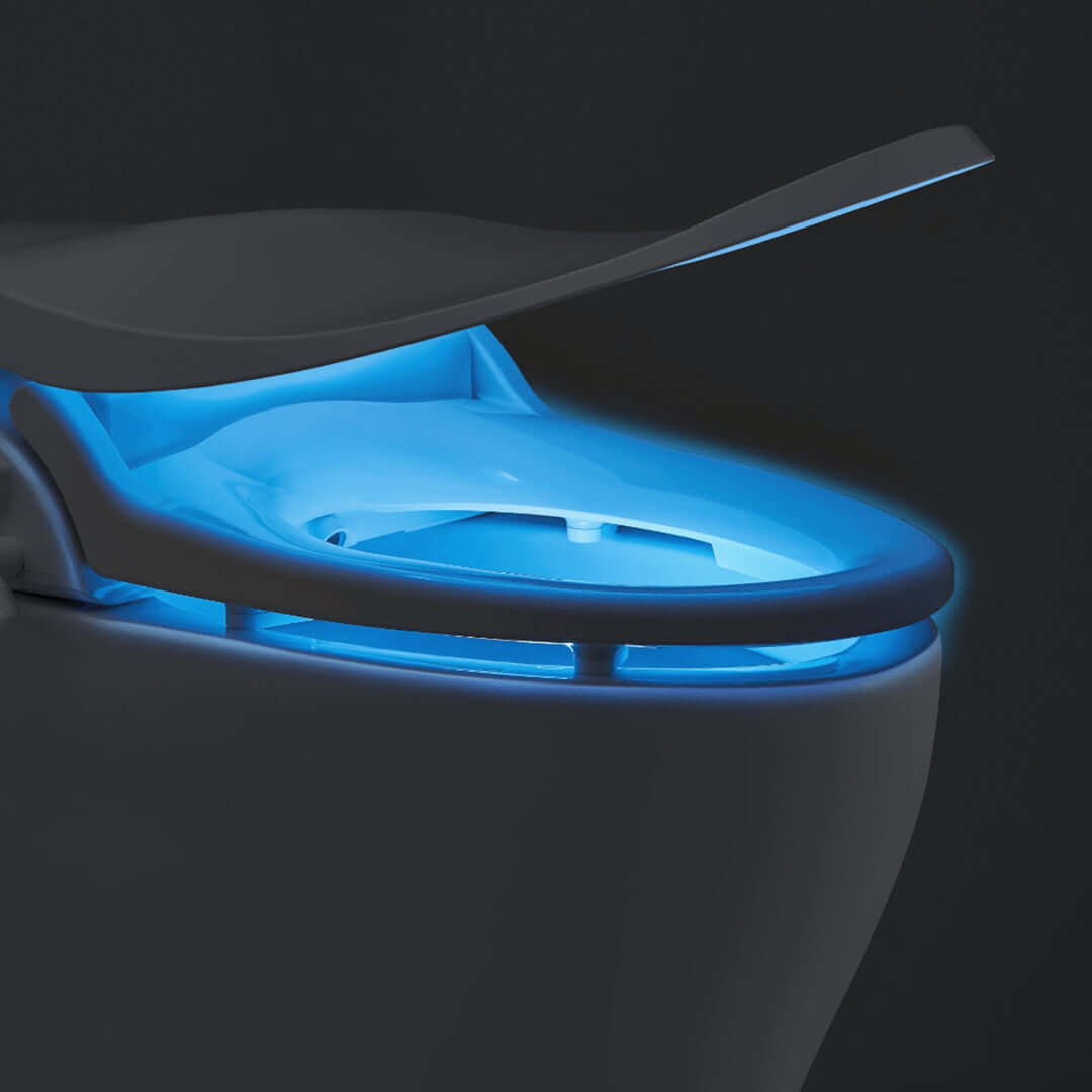 Close-up view of Bio Bidet Slim Two toilet seat featuring a soft blue night light for enhanced visibility and modern design.