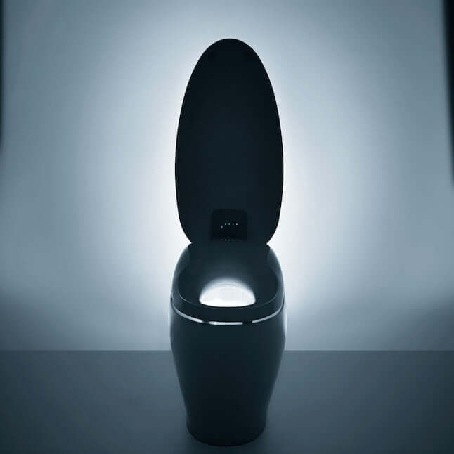 TOTO Neorest NX1 dual flush smart bidet toilet with illuminated bowl and elegant design.