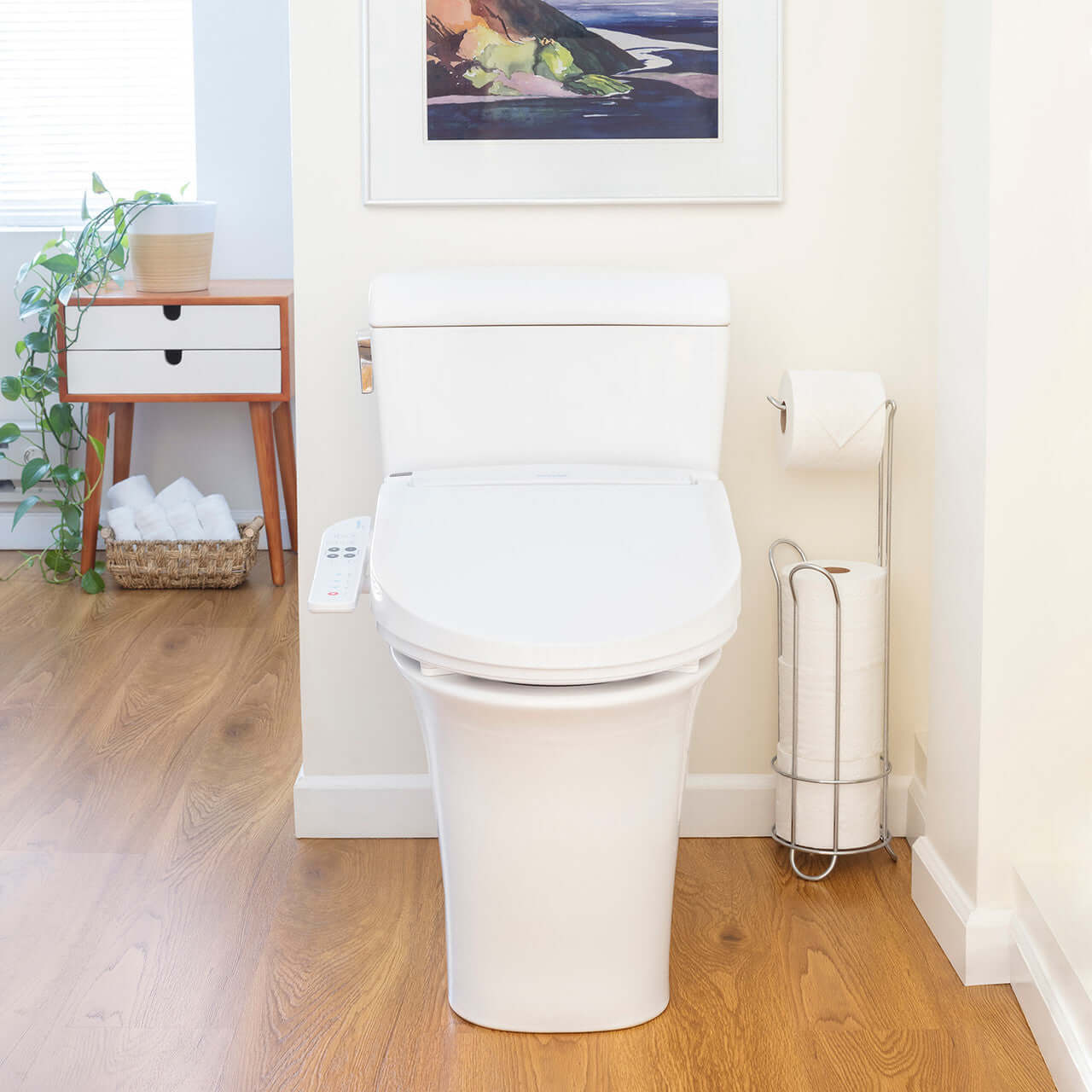 Brondell Swash BL67 bidet toilet seat in a modern bathroom setting with side arm control.