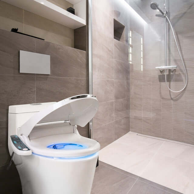 BidetMate 2000 Series Smart Bidet Toilet Seat in modern bathroom with LED nightlight and sleek design.