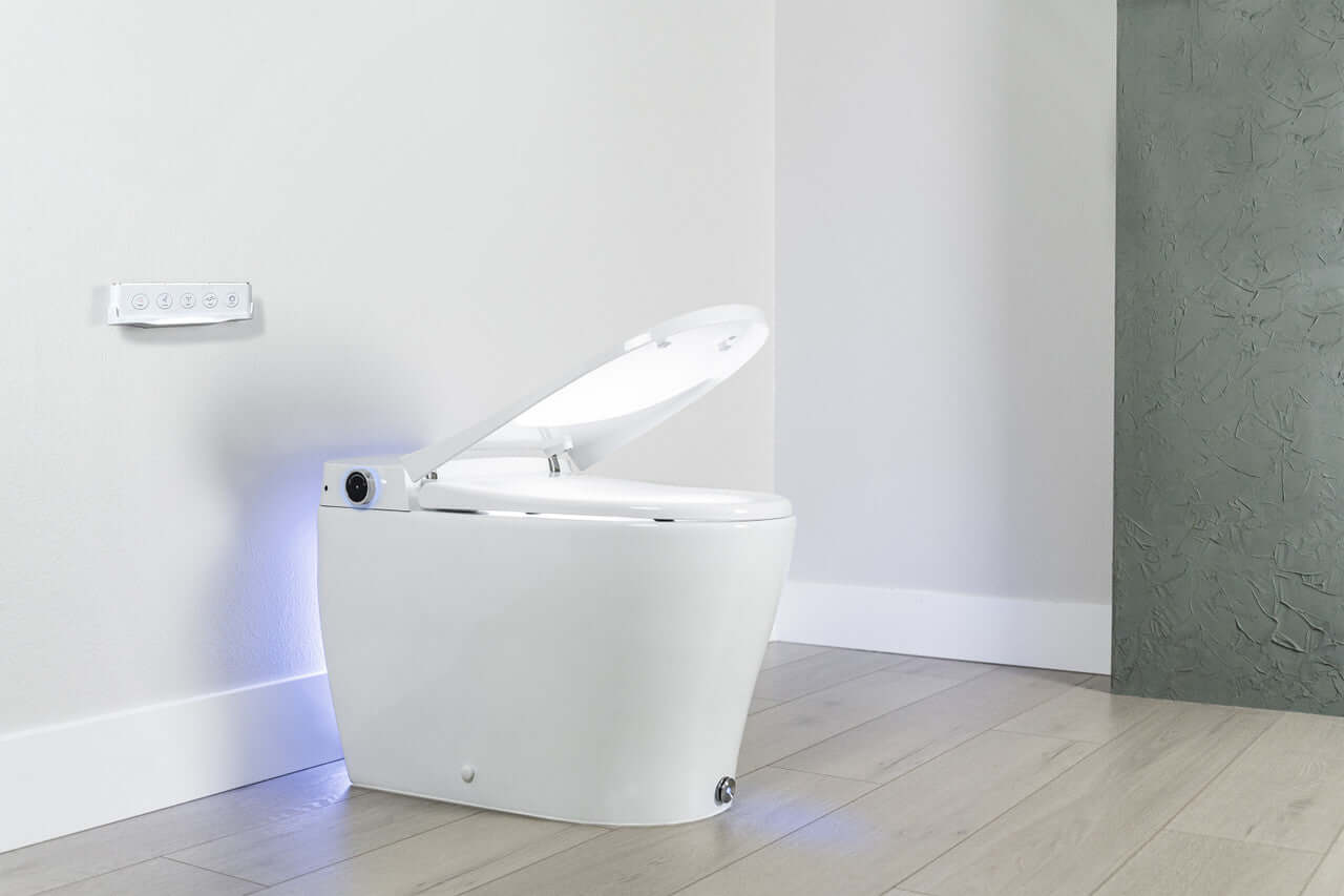 BidetMate 6000 Series Smart Bidet Toilet with heated seat and remote control in a modern bathroom.