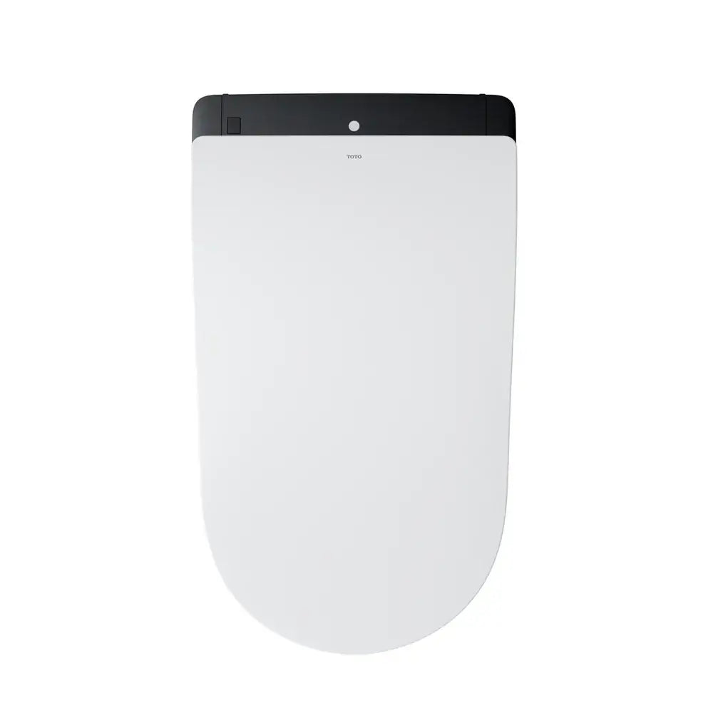 White toilet seat with black trim on a white background