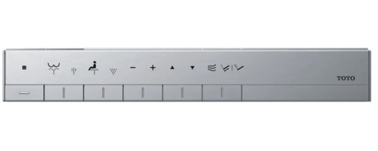 Remote control with various symbols and TOTO branding on a white background