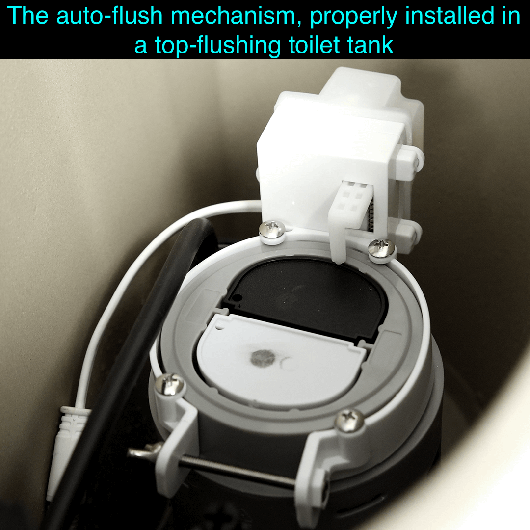 Nova Bidet Ultra NOVA auto-flush mechanism installed in top-flushing toilet tank for enhanced hygiene functionality.