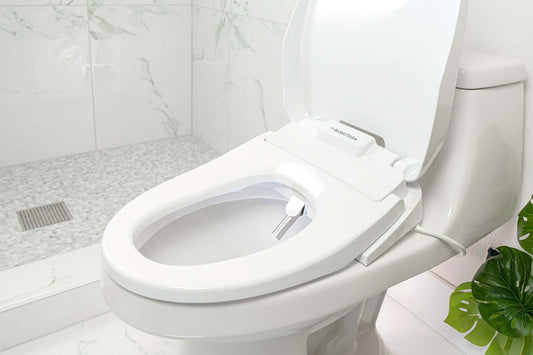 BidetMate 3500 Series Bidet Toilet Seat with automatic lid and advanced features in a modern bathroom.