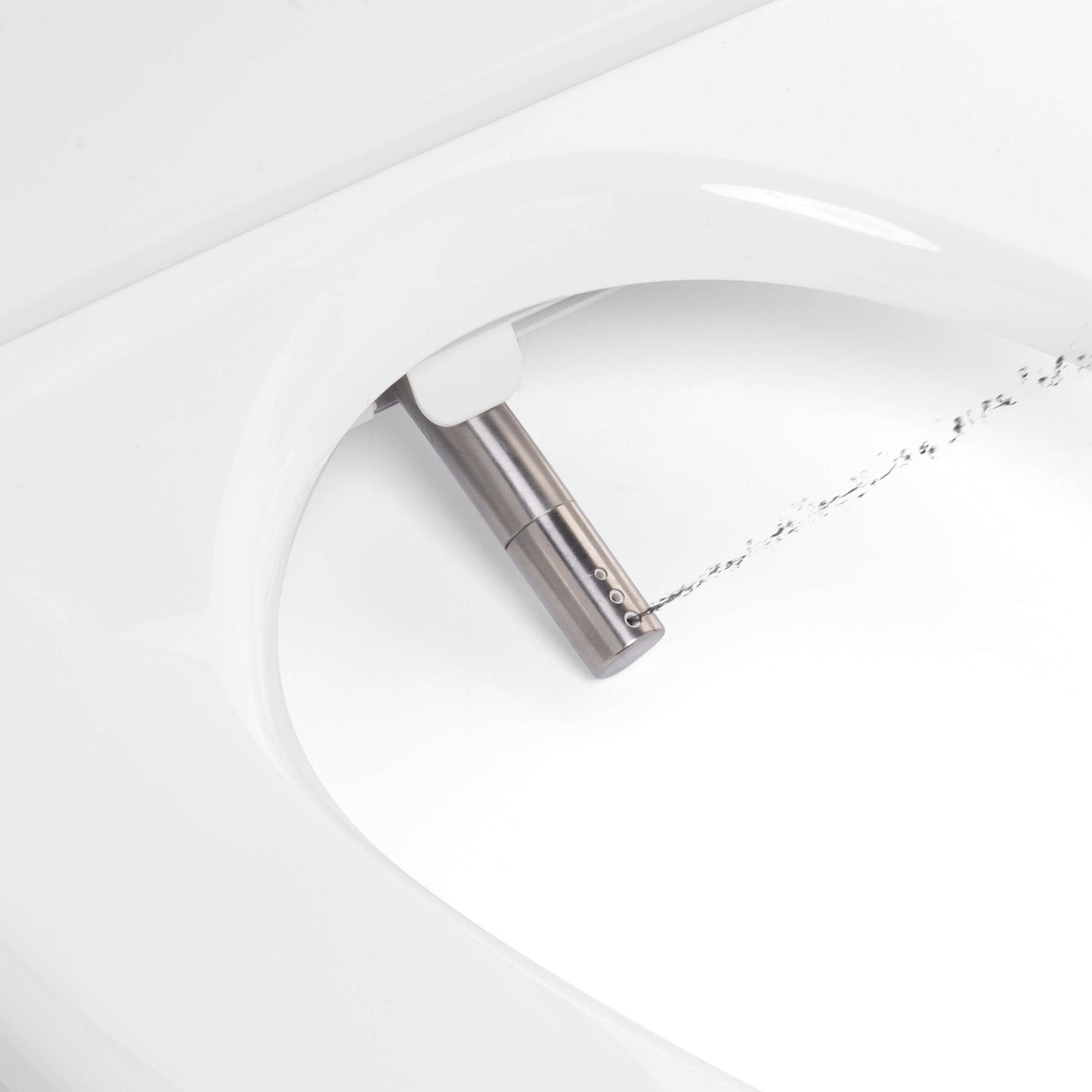 Close-up of Brondell Swash T44 bidet toilet seat nozzle with water spray for modern bathroom cleanliness.