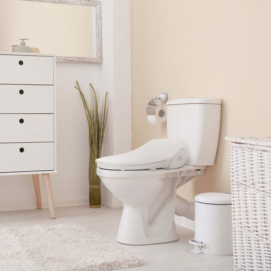 Modern bathroom featuring Bio Bidet Slim Three Smart Bidet Toilet Seat with sleek design and minimal decor.