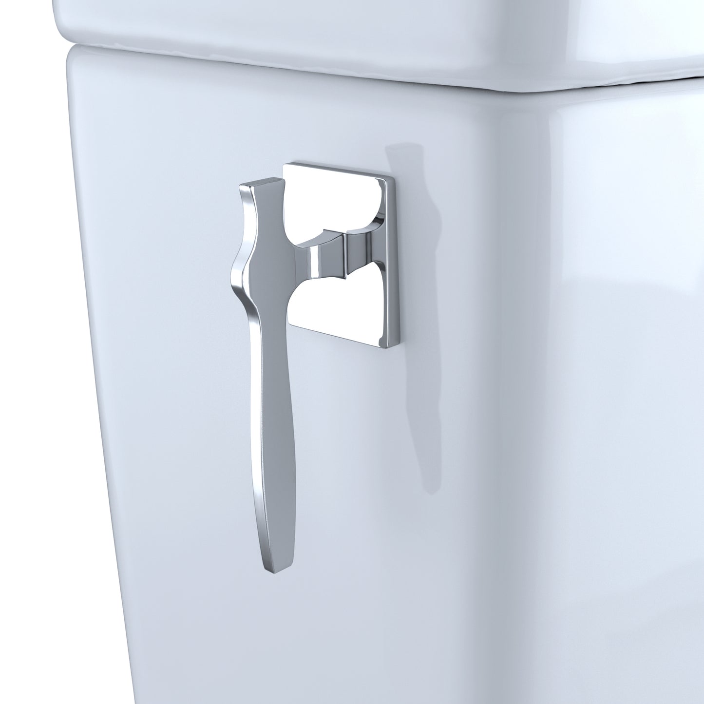 Chrome handle on a white toilet tank