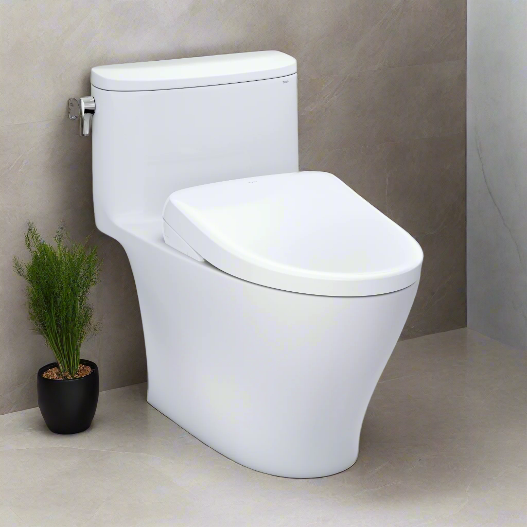 White toilet in a bathroom setting with a small plant nearby