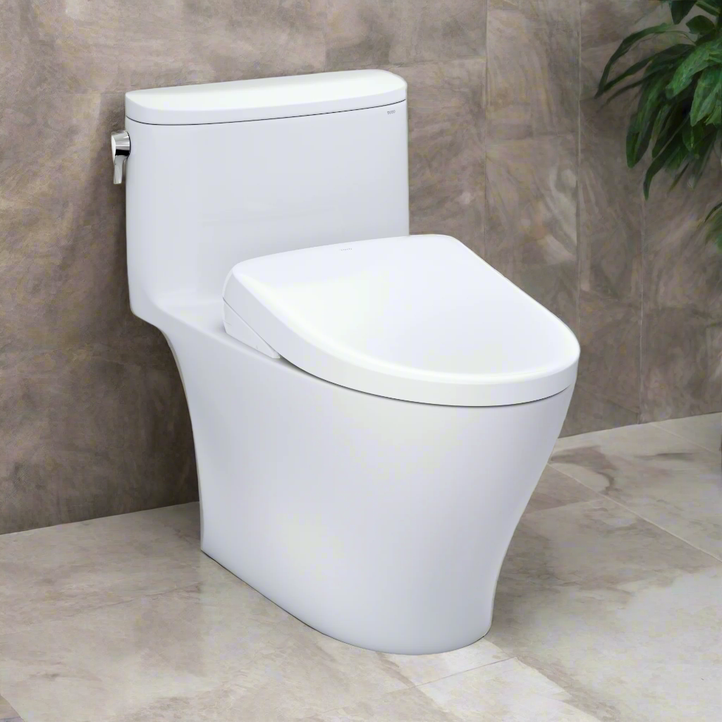 White toilet against a gray tiled wall