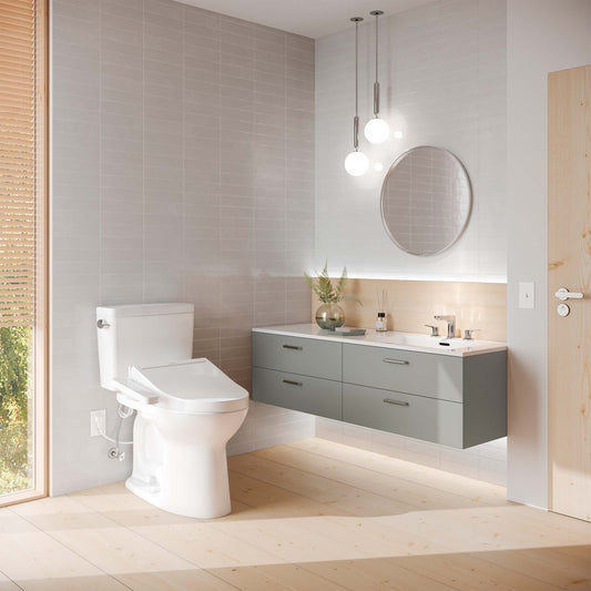 Modern bathroom featuring TOTO Drake Washlet+ C2 Bidet toilet with sleek cabinetry and stylish lighting.