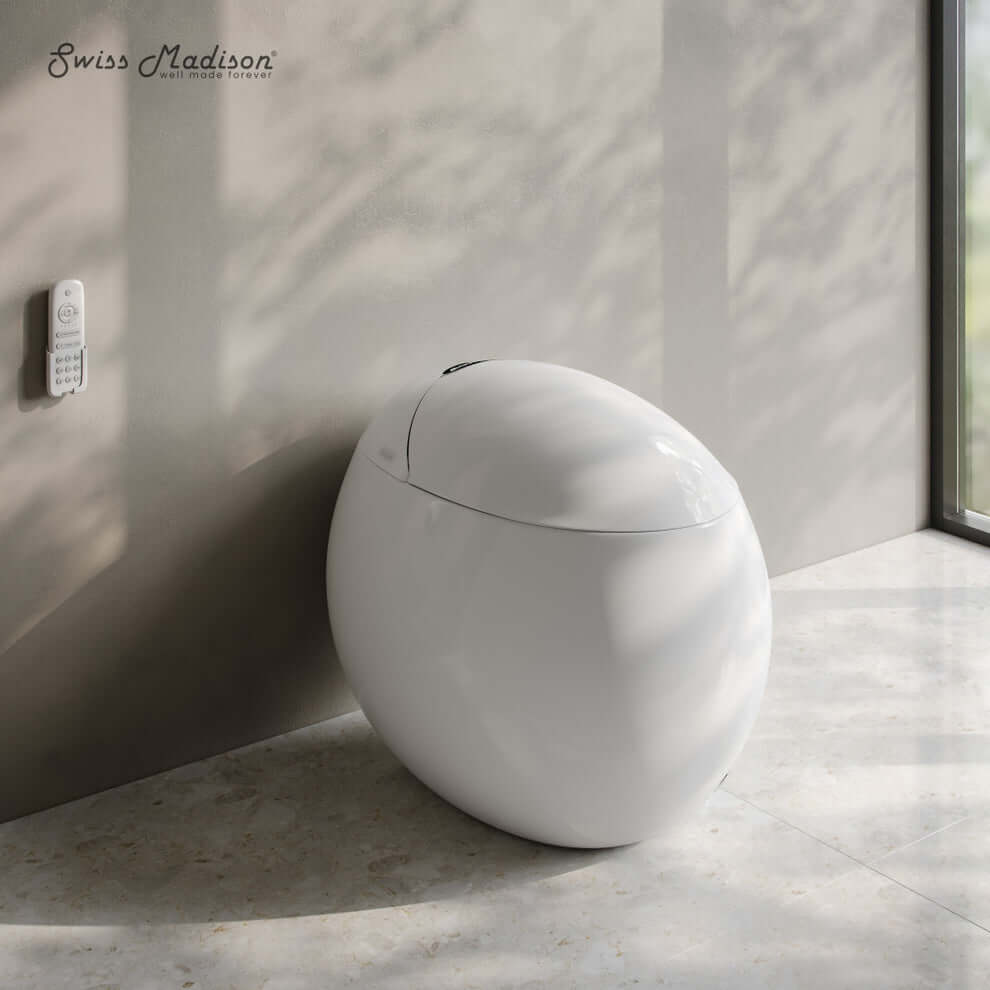 Swiss Madison Plaisir Round Smart Bidet Toilet in modern bathroom setting with remote control.