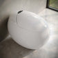 Swiss Madison Plaisir Round Smart Bidet Toilet with auto open/close feature and sleek modern design.