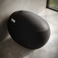Swiss Madison Plaisir Round Smart Bidet Toilet in sleek black design, featuring modern rounded shape and illuminated controls.