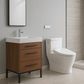 Bathroom with wooden vanity, white sink, and toilet against a gray wall.