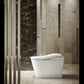 Modern white freestanding bathtub in a stylish bathroom with marble and tiled walls.