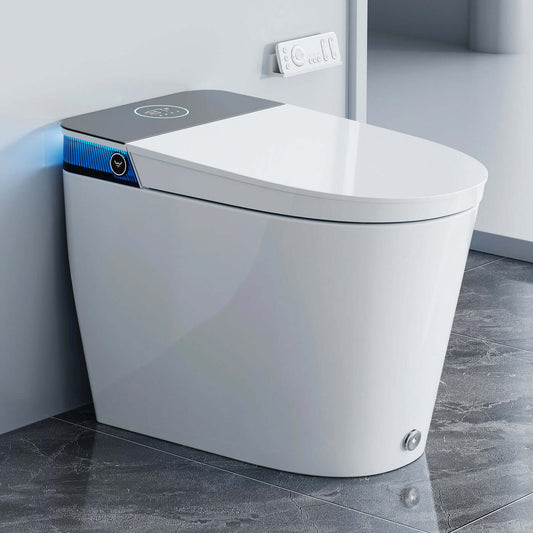 Modern white toilet with digital control panel in a bathroom setting
