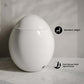 Swiss Madison Plaisir Round Smart Bidet Toilet with foot sensor and standard height design.