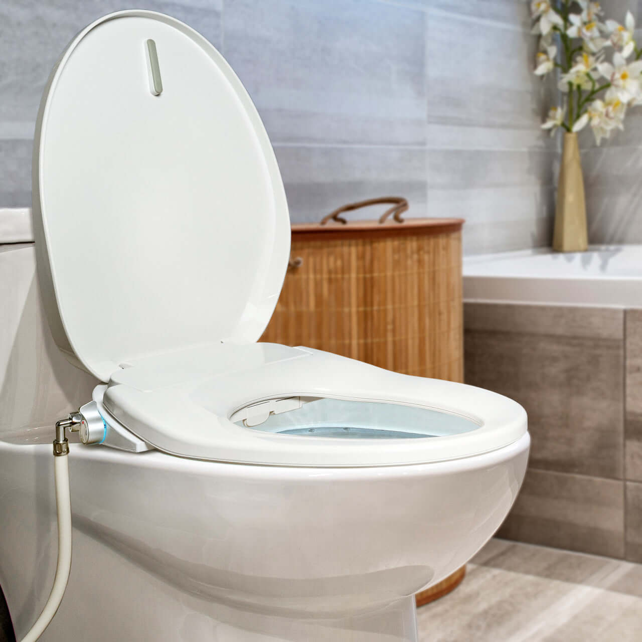 Close-up of BidetMate 700 Series Smart Bidet Toilet Seat installed in modern bathroom setting.
