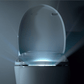Bio Bidet Discovery DLS Smart Toilet Seat - Dark view from front of toilet with lid raised and night light on 