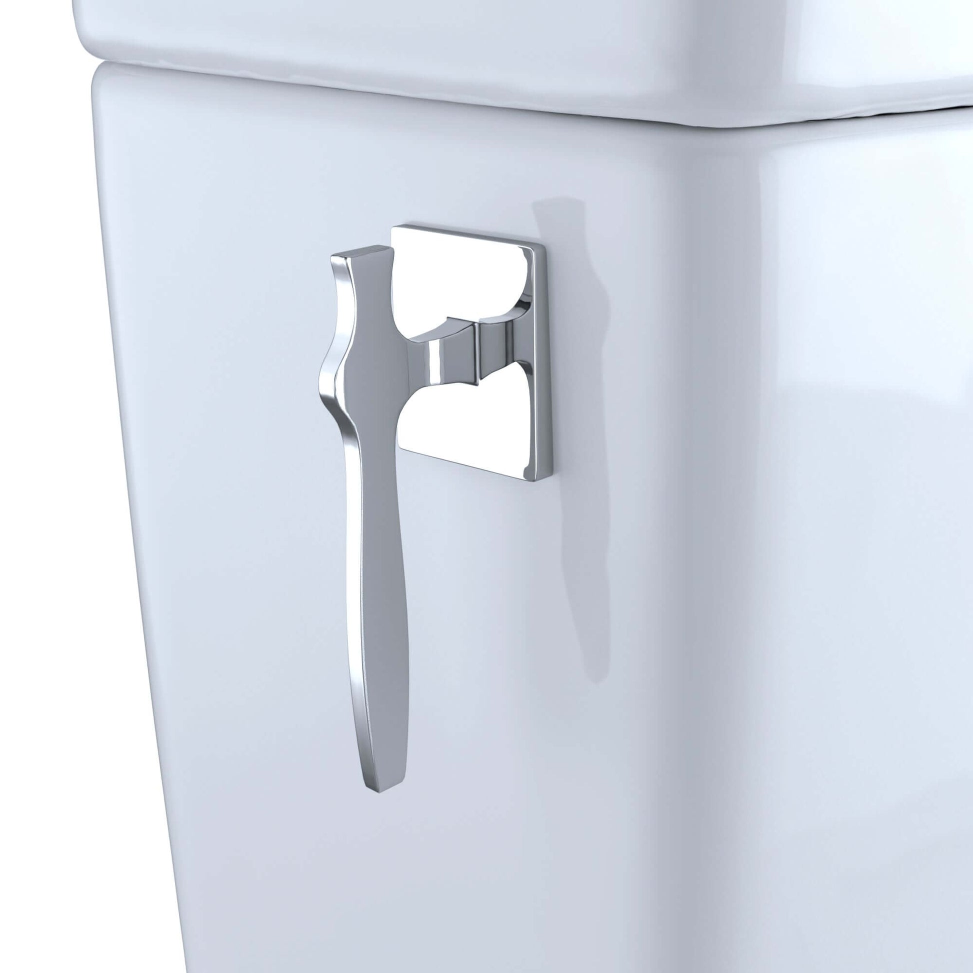Close-up of the chrome flush handle on a white toilet design, showcasing sleek and modern features.