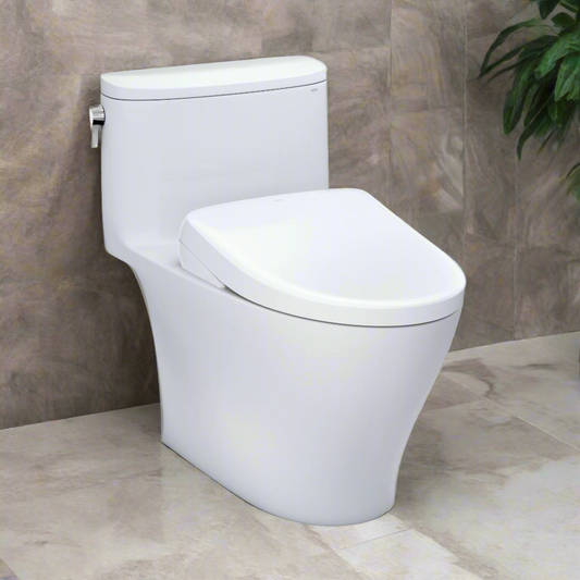 White toilet against a gray tiled wall