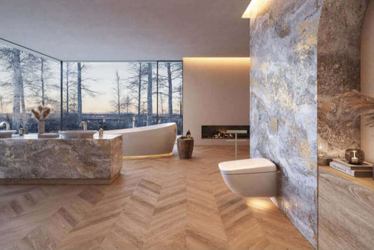 Toilet mounted on marble wall with night light shining below it