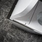 TOTO Neorest LS Smart Bidet Toilet close-up on marble floor, showcasing modern design and sleek features.