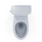 White toilet bowl with tank on a white background